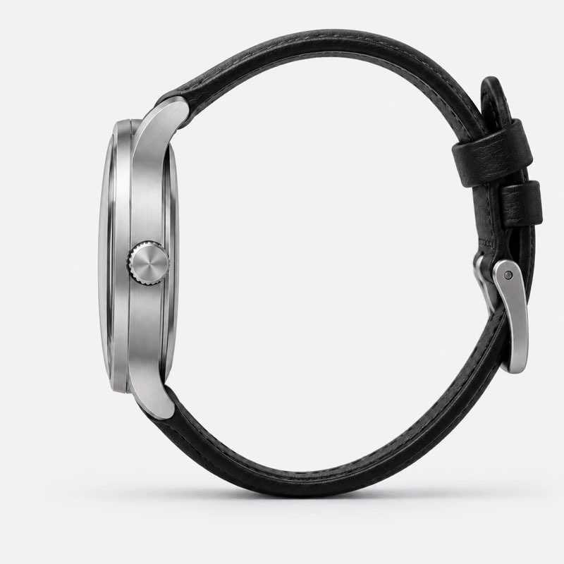 Steel watch, side view with the crown