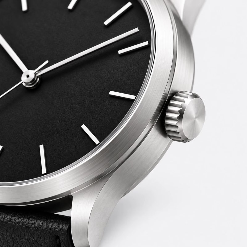 Close-up of the watch dial, bezel and crown